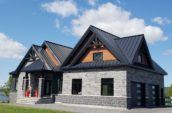 exterior of home with new dark metal roof