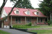 exterior of home with new red roof