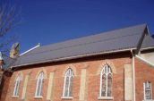 exterior of church with new metal roofing