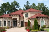 red stone coated roofing on roof of home