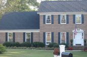 exterior of home with stone coated roofing