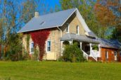 platinum shingles on exterior of home with large grass lawn